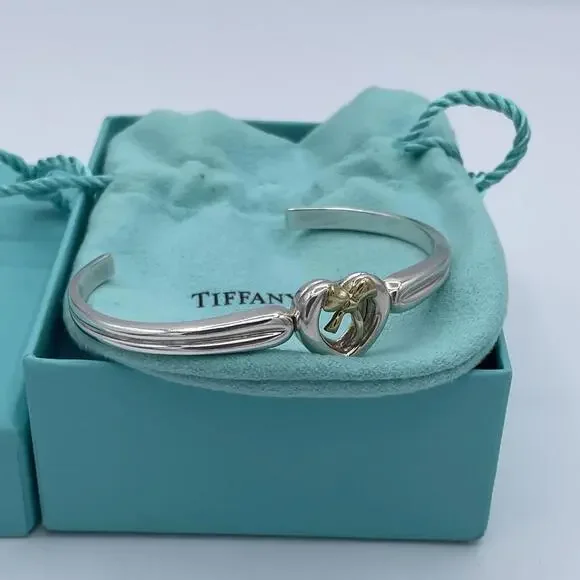 Tiffany & Co Sterling Silver and 18K Yellow Gold Heart Bow Ribbon Cuff Bracelet